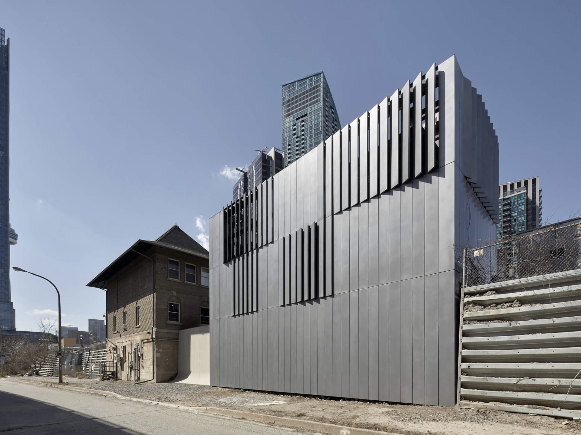 RDHA designs a polished aluminum facade for Scott Street Generator in Toronto